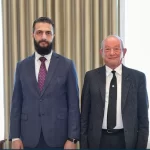 من استقبال الرئيس أحمد الشرع رجل الأعمال المصري نجيب ساويرس في قصر الشعب بدمشق -مصدر