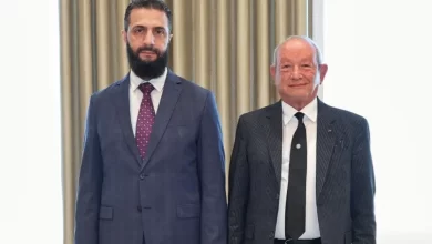 من استقبال الرئيس أحمد الشرع رجل الأعمال المصري نجيب ساويرس في قصر الشعب بدمشق -مصدر