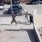 صورة مأخوذة من شريط فيديو للمسلحين خلال هجومهم على الكنيسة في قرية حمود الأردنية