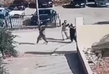 صورة مأخوذة من شريط فيديو للمسلحين خلال هجومهم على الكنيسة في قرية حمود الأردنية